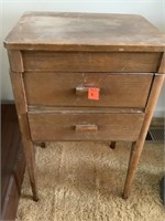 Antique sewing cabinet.  Some wear.  25.5” tall x