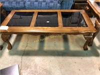 Oak glass top coffee table 17 inches tall by 49