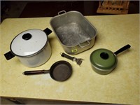 Mixed lot of pans, cast iron skillet