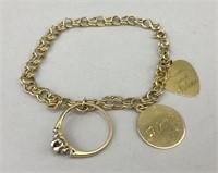 14K Gold Charm Bracelet.