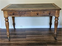 Antique Oak Leather Inlay Desk on casters.