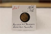 1854 TYII $1.00 Gold. Solder on reverse has been