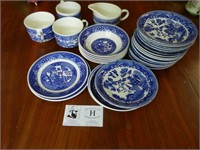 Large Group of Blue and White Plates and Cups
