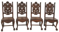 Set of Four Figural Carved Oak Chairs