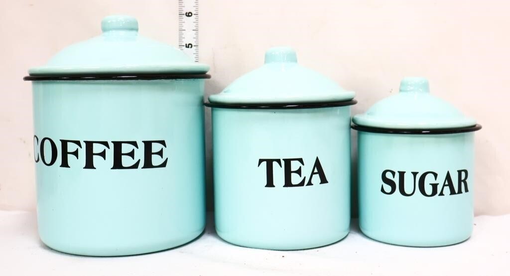 Trio of green enamel canisters