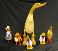 Six various 'Dcuk' carved wood duck figures