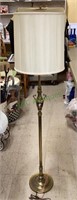 Gorgeous brass floor lamp with shade. Lamp is 58