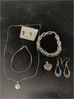 Lot of sterling silver jewelry: bracelets, pawn ea
