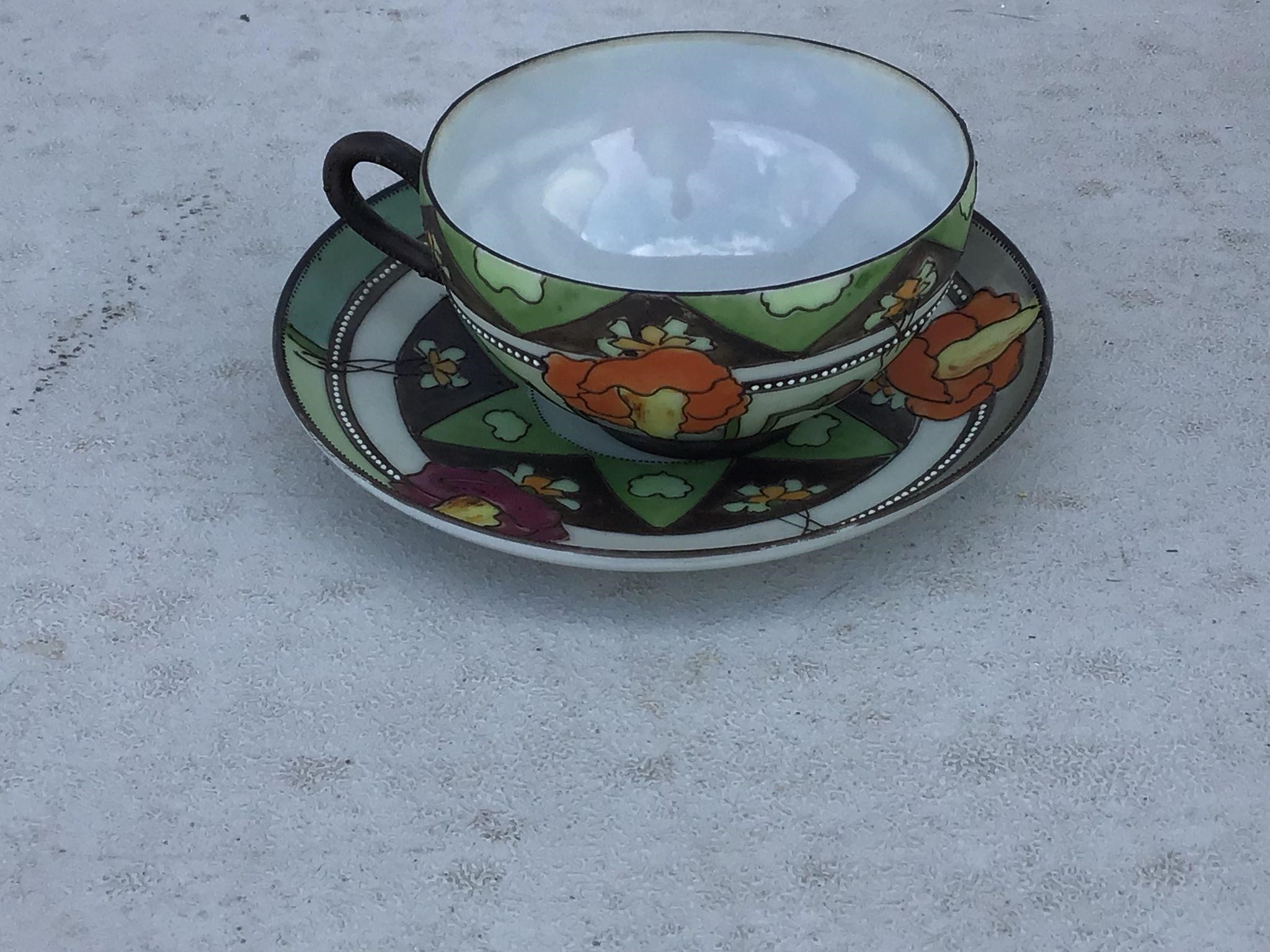 VERY COLORFUL CUP AND SAUCER