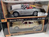 1:18 scale diecasts: Honda S2000 and Jaguar, NIB