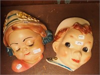 Two chalkware string holders: sailor boy and