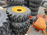 QTY 4 Unused 10-16.5 SkidSteer Tires on Yellow