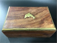 Lovely brass and mahogany box with a dolphin on to