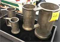 FOUR FRENCH PEWTER TANKARDS