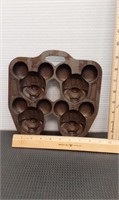 Vintage cast iron Mickey Mouse muffin cake mold.