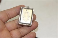 A Sterling Locket Pendant