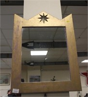 Modern mirror in wooden frame.