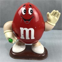 MNM candy dispenser candy comes out and right