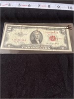 1953 two dollar bill. Red seal