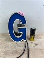 Metal light up “G” untested