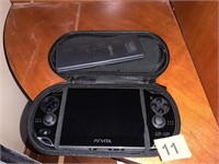 SONY PS VITA HANDHELD GAME SYSTEM IN CASE W/8