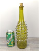 WINE BOTTLE WITH METAL BEADED COVER