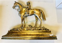 Antique bronze jockey & horse doorstop, with a