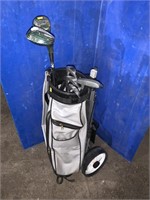 Set of right hand golf clubs, bag and pull cart