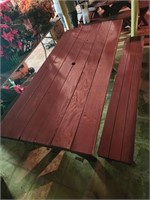 Red picnic table with benches