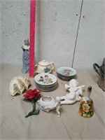Collectible Avon plates, decorative statues and