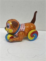 TIN dog playing with ball toy made in Japan