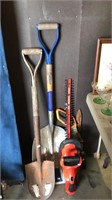 Group of garden tools including a aluminum scoop