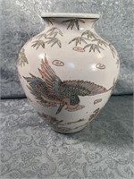 A- vase with birds