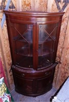 Curved glass corner cabinet w/ drum shaped