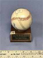 Signed Nolan Ryan baseball, in display holder and