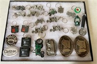 Oliver Cletrac & others,  pins, keychains w/ case