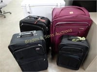 GROUP OF 4 USED SUITCASES