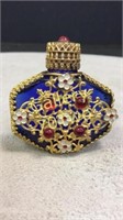 Antique gilded glass perfume bottle with enamel