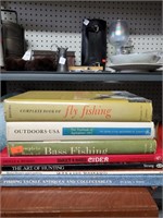 Stack of Various Fishing Books