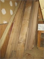 Various kinds and lengths of lumber. Measures