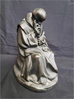 Cast bronze monk figure with rosary, marked Pascal