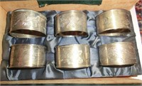 6 Chinese dragon napkin rings marked SILVER