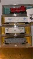 Lot of toy train cars in cases