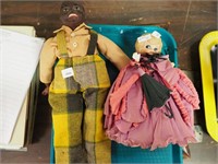 Kewpie googly-eye doll in crepe paper clothing,