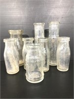 Collection of vintage glass creamer bottles