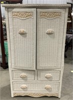 Wicker armoire measuring 38 x 62 1/2 x 21