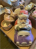 Santa Claus and cat figurines