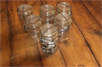 Vintage buttons in glass bail top jars