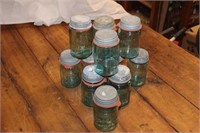 Vintage blue glass jars with metal lids