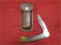 1 Uncle Henry pocket knife w/ leather sheath